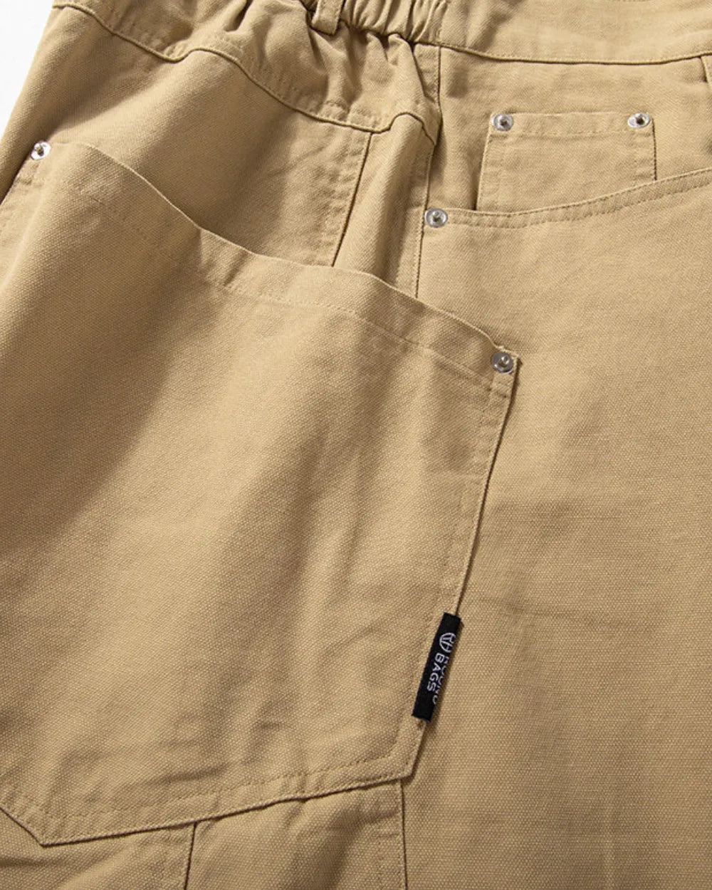 LOOSE FIT CURVED CARGO PANTS W1990