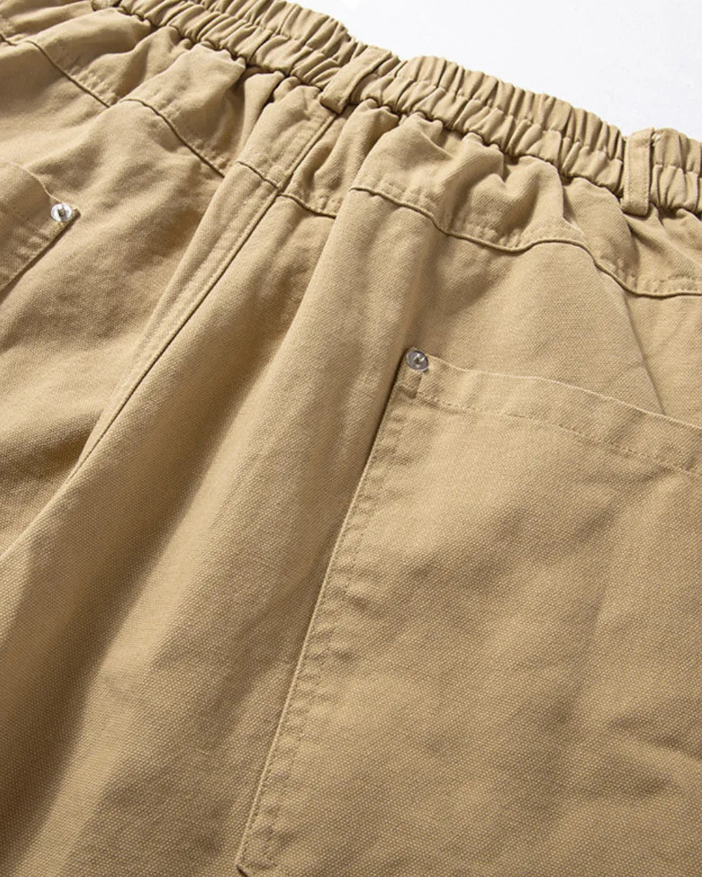 LOOSE FIT CURVED CARGO PANTS W1990